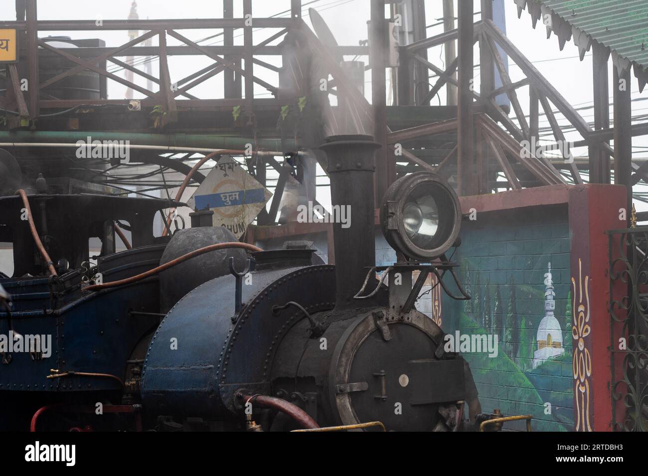 close up shot showing the light and small steam engine of the toy train