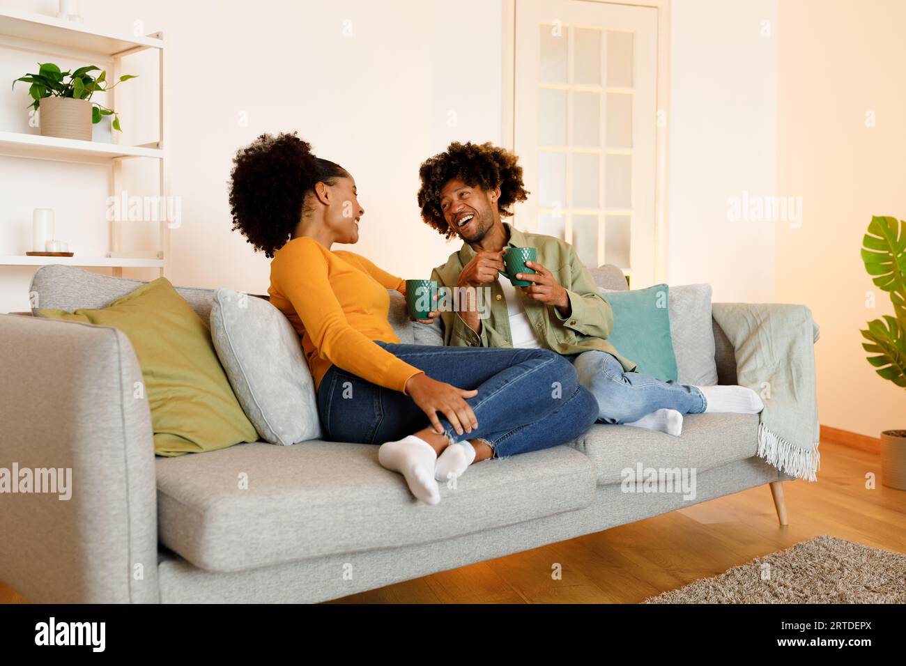 Happy African American Couple Enjoying Relaxing Coffee Break Together ...