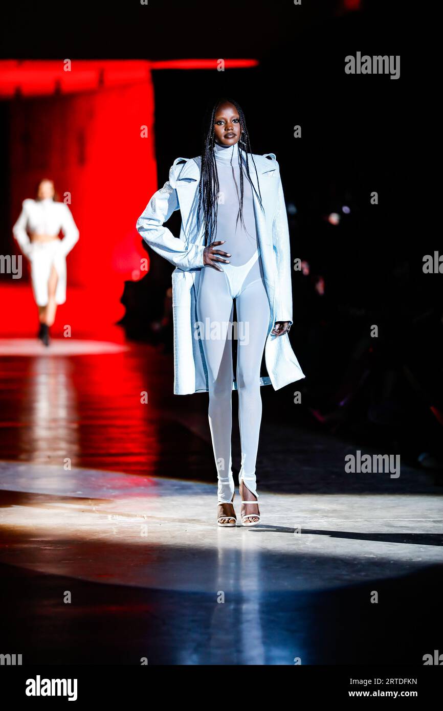 New York, USA. 11th Sep, 2023. A model walks on the runway at the