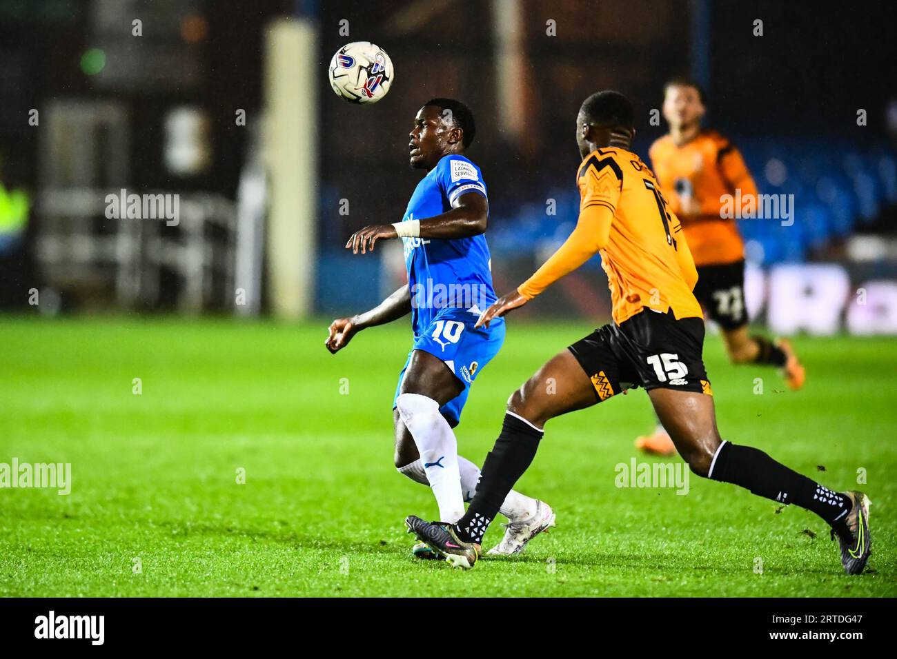 Ephron Mason Clarke (10 Peterborough United) challenged by Jubril Okedina (15 Cambridge United) during the EFL Trophy match between Peterborough and Cambridge United at London Road, Peterborough on Tuesday 12th September 2023. (Photo: Kevin Hodgson | MI News) Credit: MI News & Sport /Alamy Live News Stock Photo