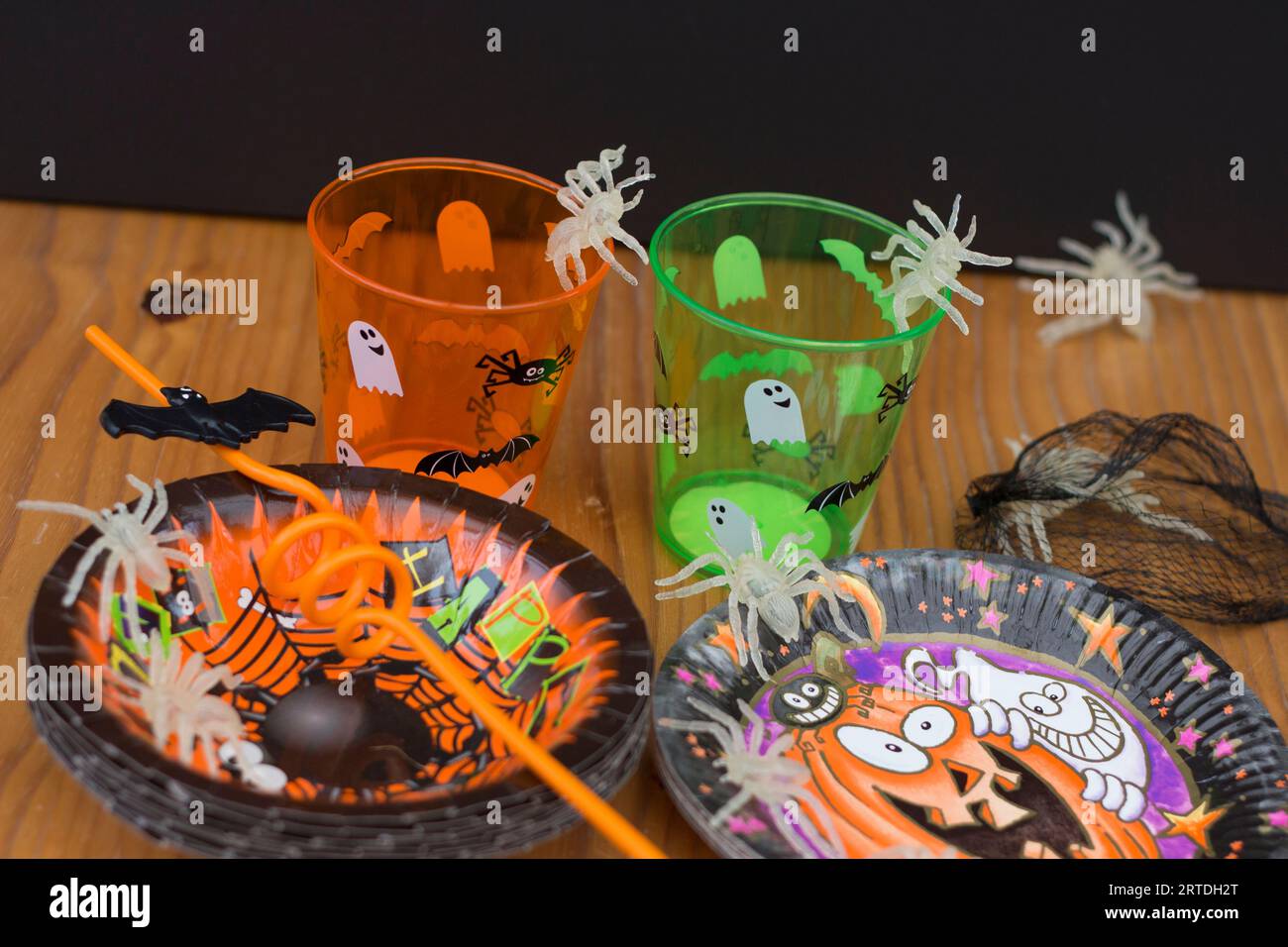 Spiders gathering at halloween theme party on table at night Stock Photo
