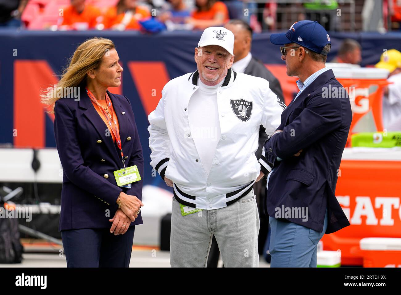 From left, Denver Broncos owners Rob Walton and his daughter, Carrie Walton  Penner, join Hannah McNair and her husband, Houston Texans chairman and  chief executive officer Cal McNair, before an NFL football