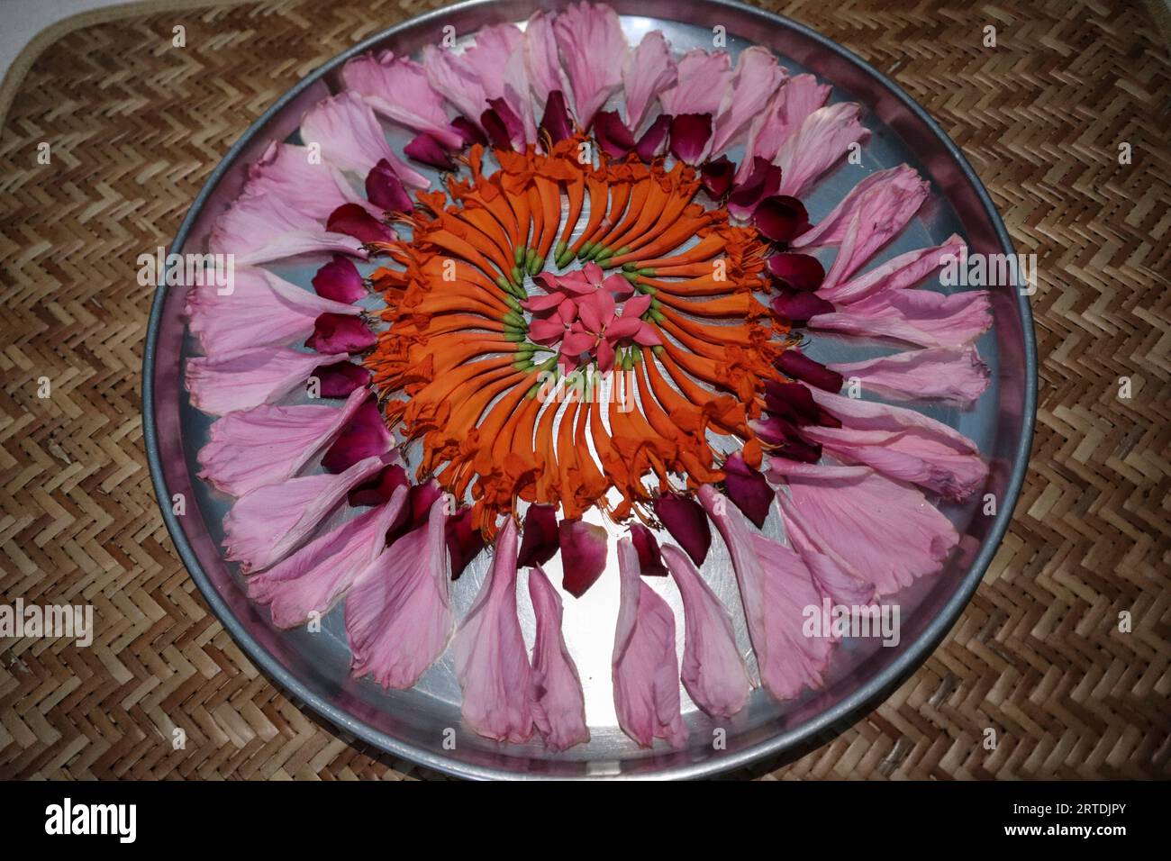 Beautiful flower rangoli also used as aarti thali decorated on pooja thaali Stock Photo