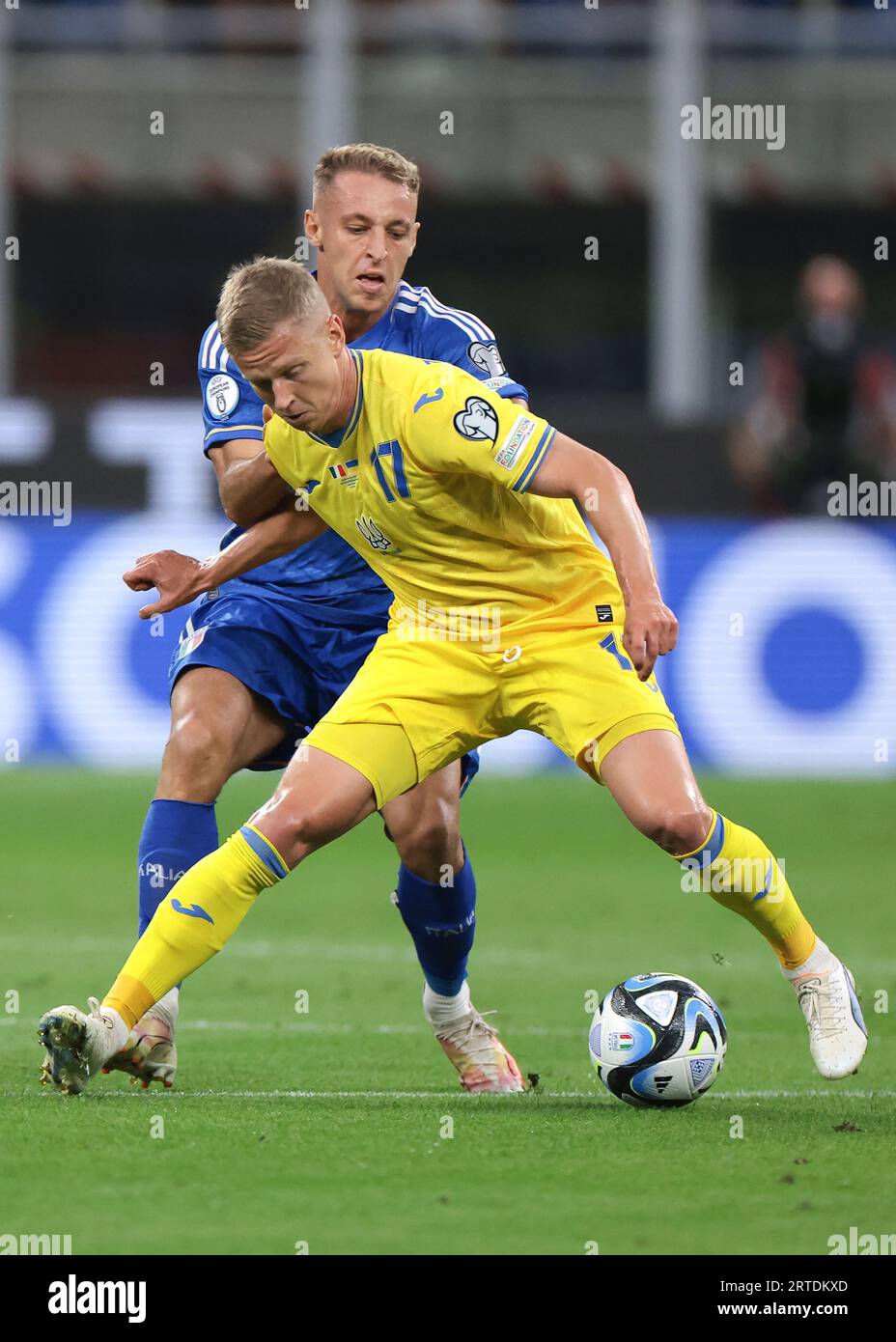 Milan, Italy. 12th Sep, 2023. Davide Frattesi of Italy tussles with