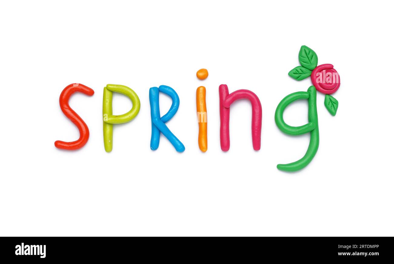 Word SPRING made of play dough on white background Stock Photo Alamy