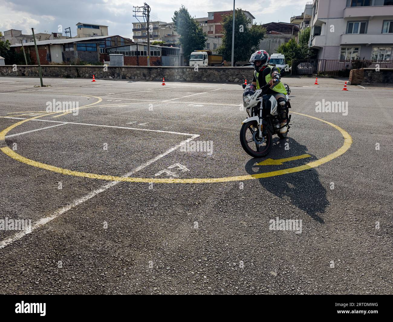 Bursa Turkey - September 09 2023 Man is practicing driving a motorcycle in a driving school . High quality photo Stock Photo