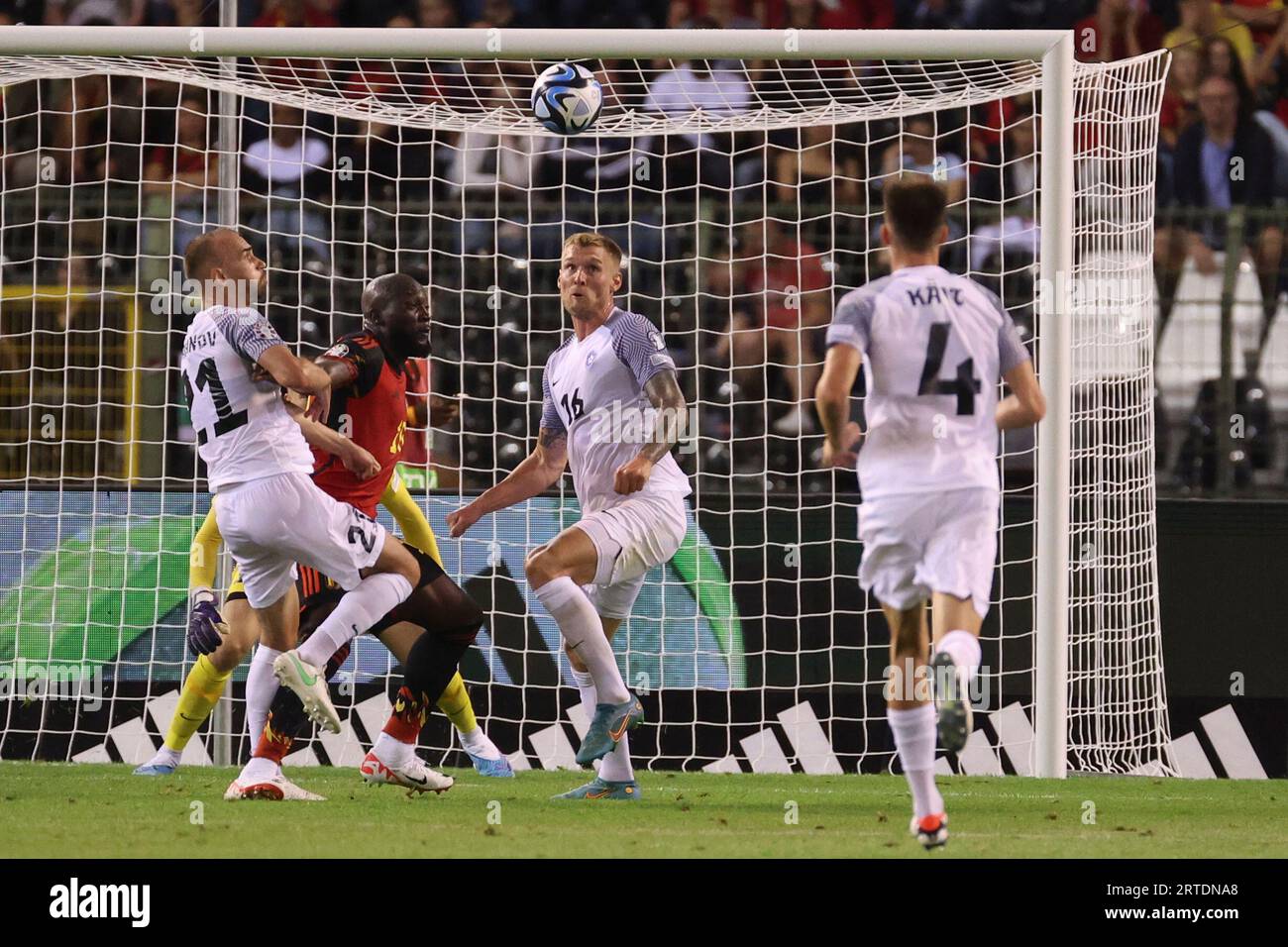 Belgium's Romelu Lukaku, second left, fights for contol of the ball against Estonia's Nikita Baranov, left, and Estonia's Joonas Tamm, second right, during the Euro 2024 group F qualifying soccer match between Belgium and Estonia at the King Boudouin Stadium in Brussels, Tuesday, Sept. 12, 2023. (AP Photo/Geert Vanden Wijngaert) Stock Photo