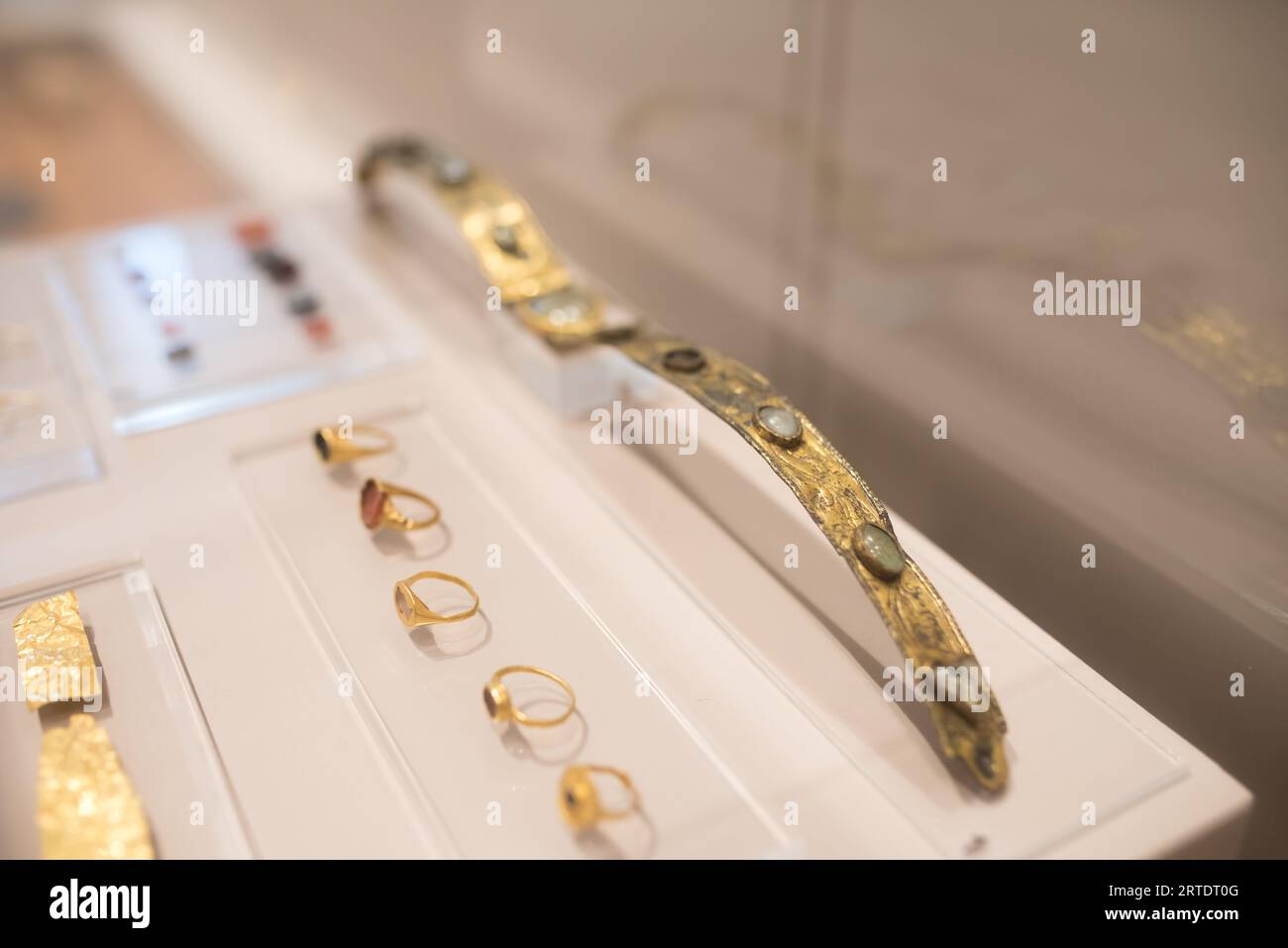Ancient Minoan gold rings on display in the museum. Stock Photo
