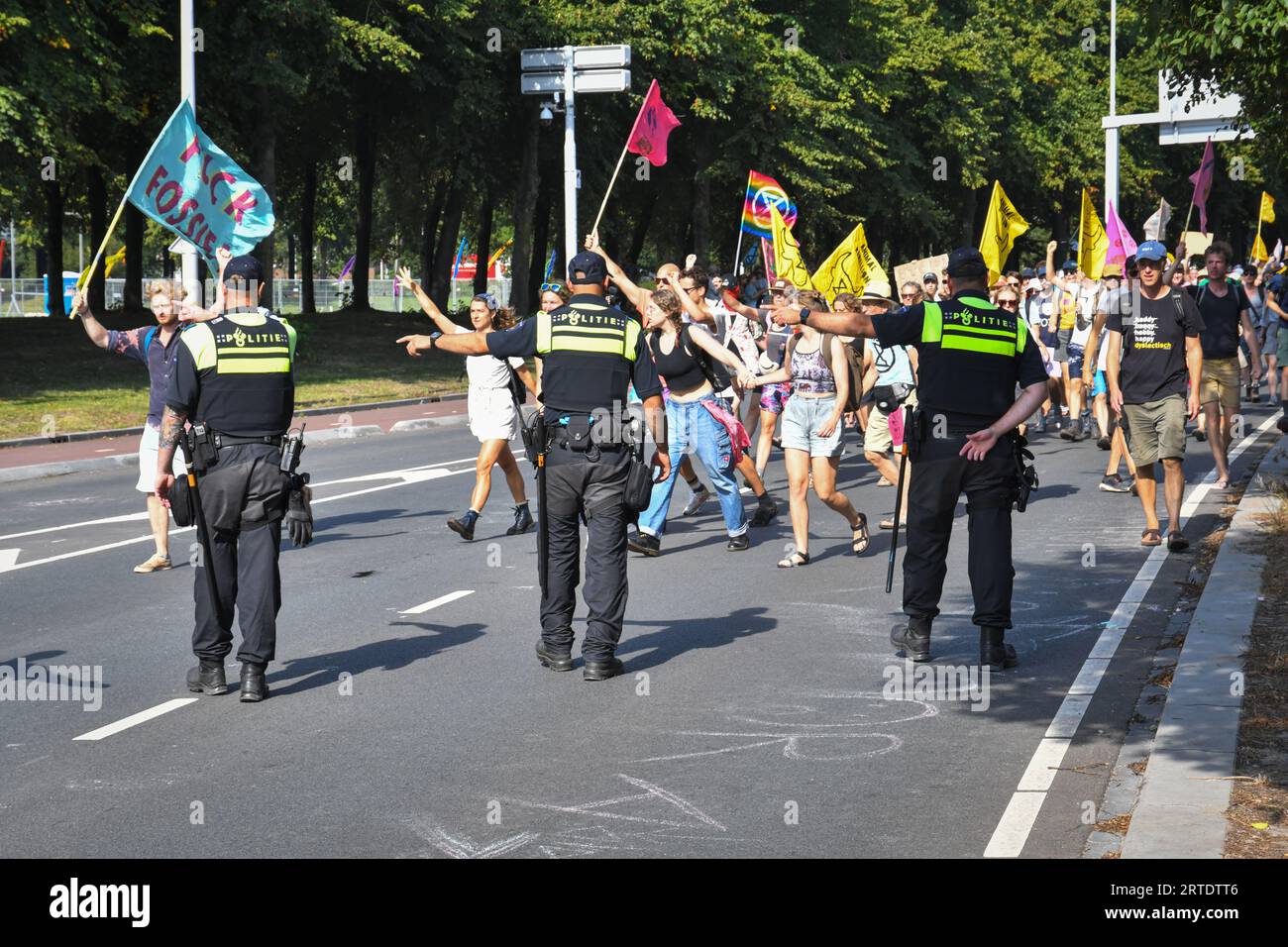 The Hague,The Netherlands, 10th september,2023. Extinction rebellion activists protested by blocking the A12 motorway again. A Watercannon was used and police removed and arrested hundreds of people.The protesters want to return every day to block the road Stock Photo