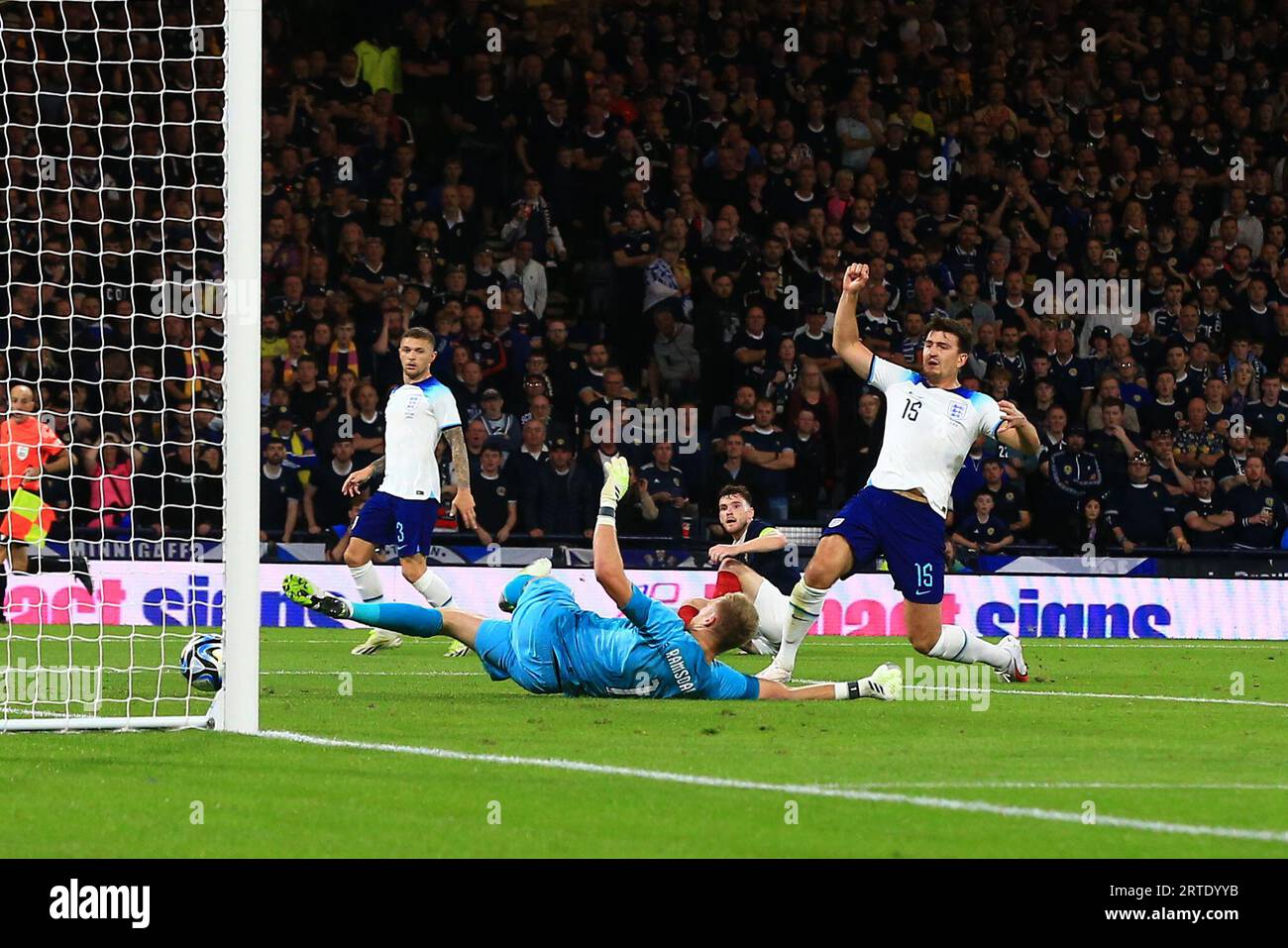 12th September 2023; Hampden Park, Glasgow, Scotland: International Football Friendly, Scotland versus England; Harry Maguire of England diverts an own goal for 2-1 past his keeper Ramsdale in 67th minute Stock Photo
