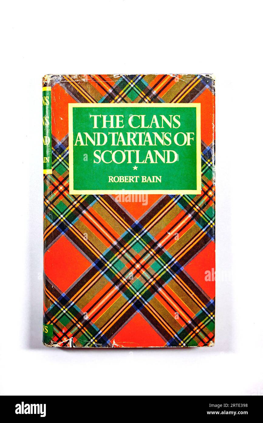 vintage book the clans and tartans of scotland book by robert bain isolated against a white studio background Stock Photo