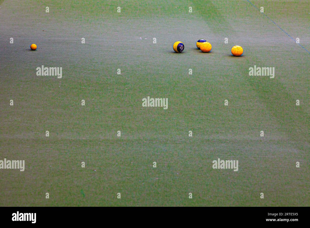 Abstract image of balls on a lawn bowling surface in Richmond British Columbia Canada Stock Photo