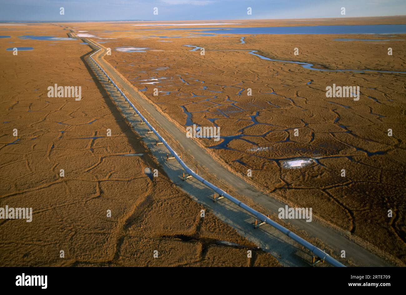 Aerial view of oil pipelines on tundra; North Slope, Alaska, United States of America Stock Photo