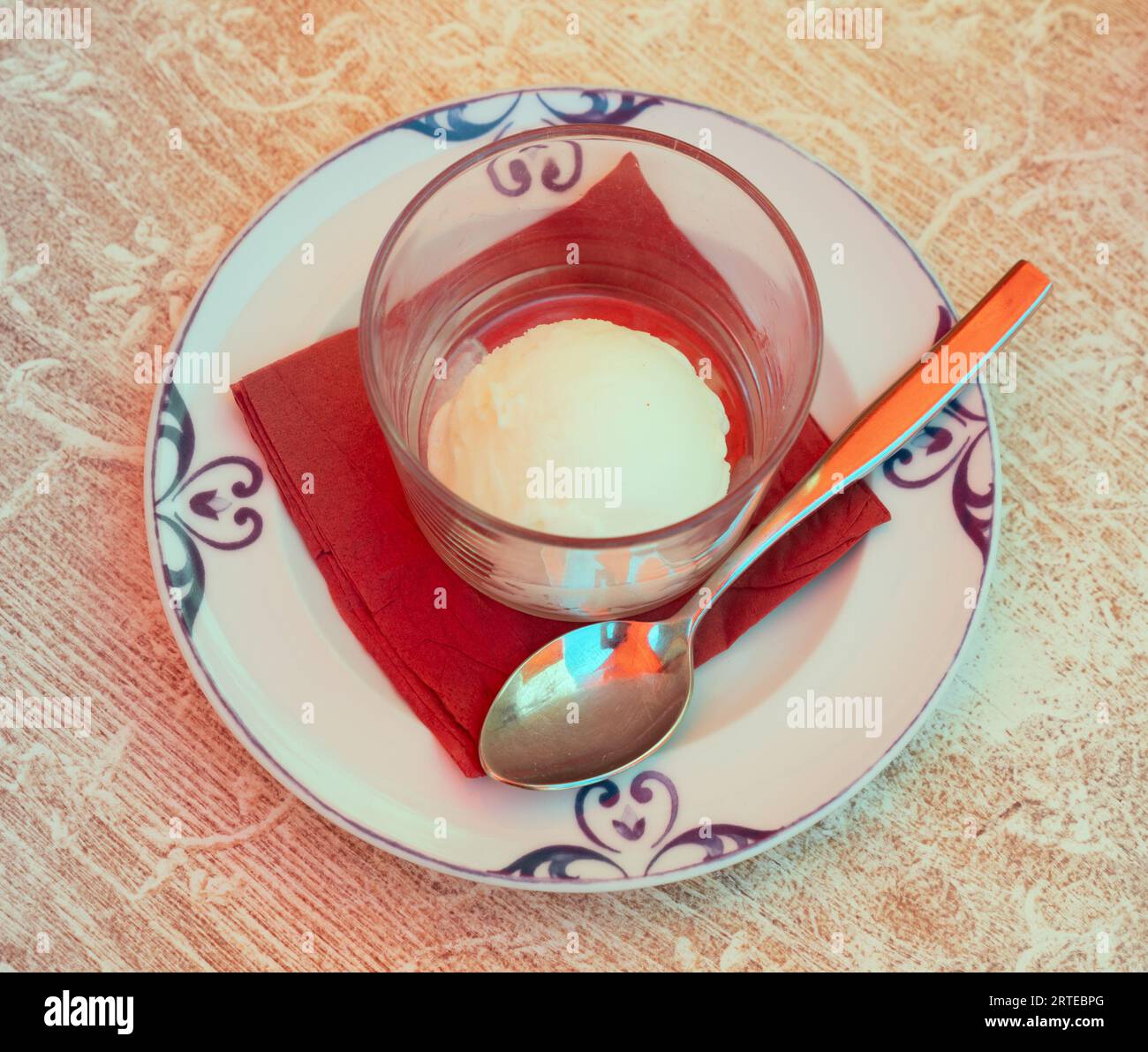 Scoop of refreshing lemon sorbet icecream with zest and mint on a white  background Stock Photo - Alamy