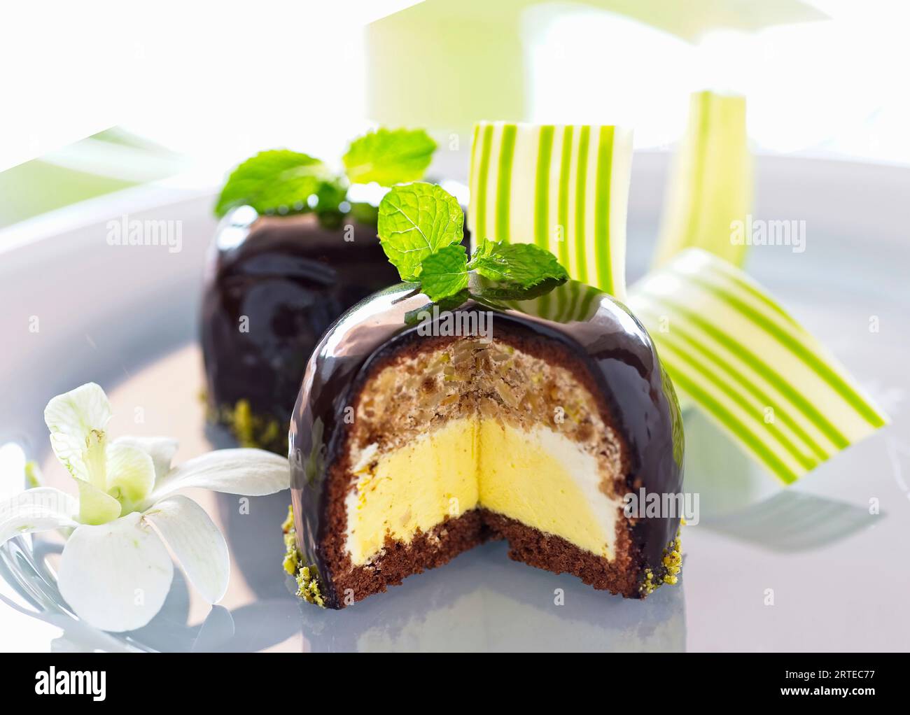 Chocolate Mirror Glaze Cake with vanilla and nuts Stock Photo