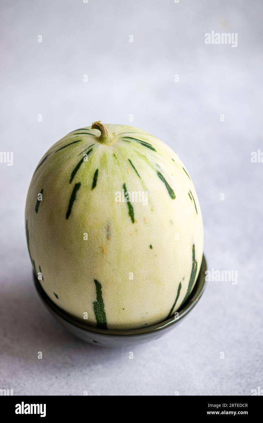 Pale green honeydew melon Stock Photo