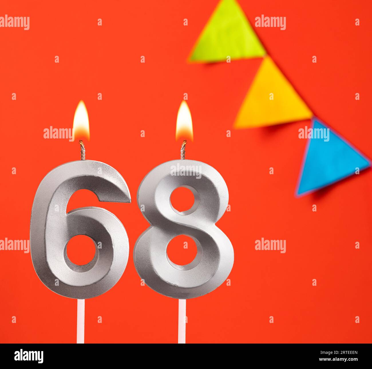 Birthday card - Number 68 candle in orange background Stock Photo - Alamy