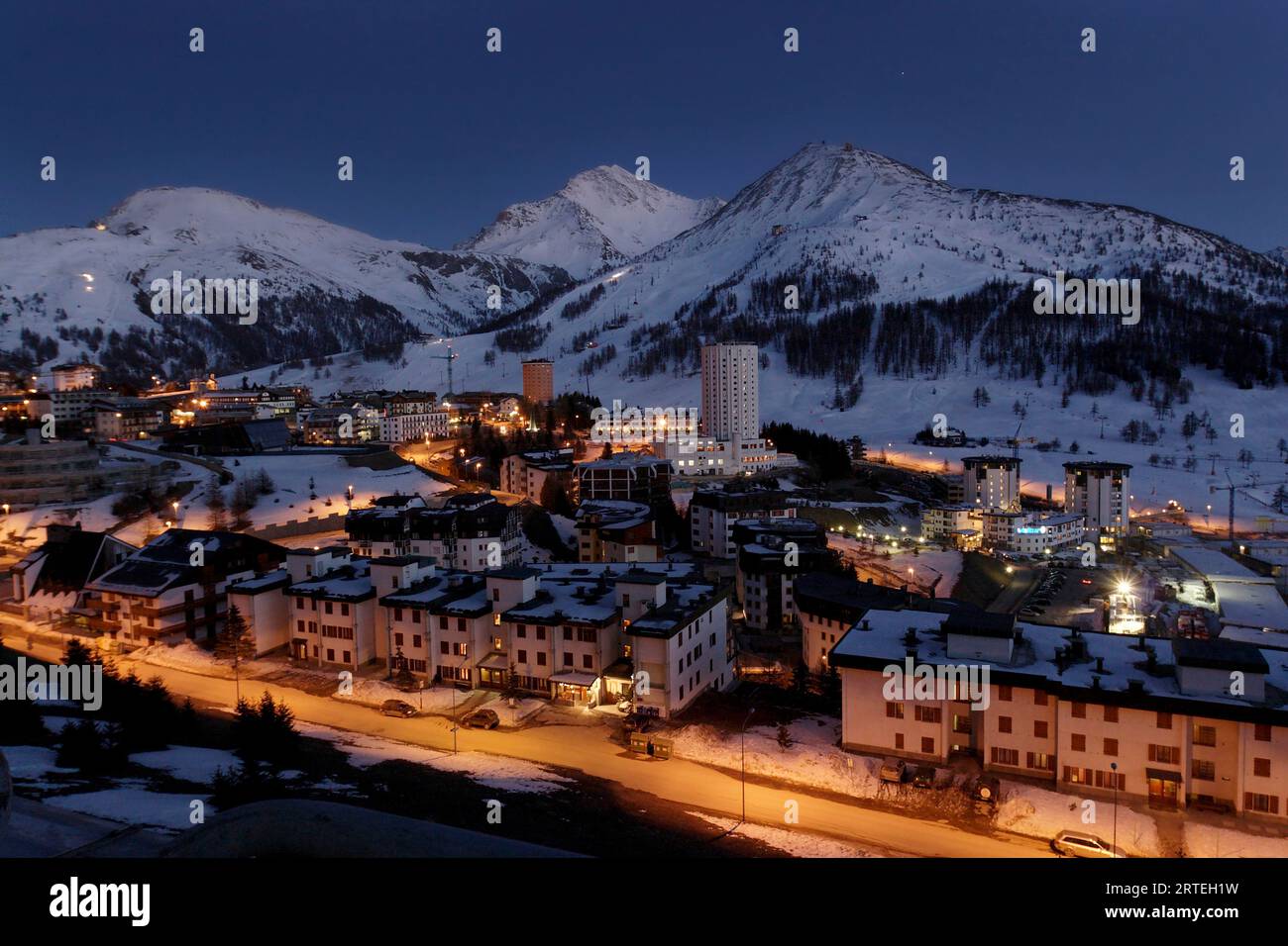 Evening view of the snow-covered resort town of Sestriere, Italy; Sestriere, Italy Stock Photo
