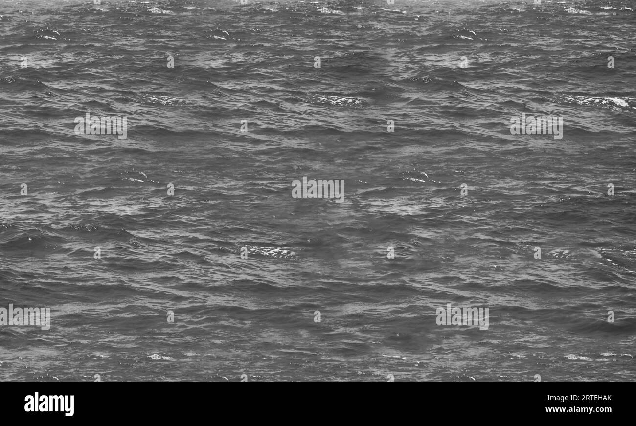 Black and white photo of the surface of the water in the sea Stock ...