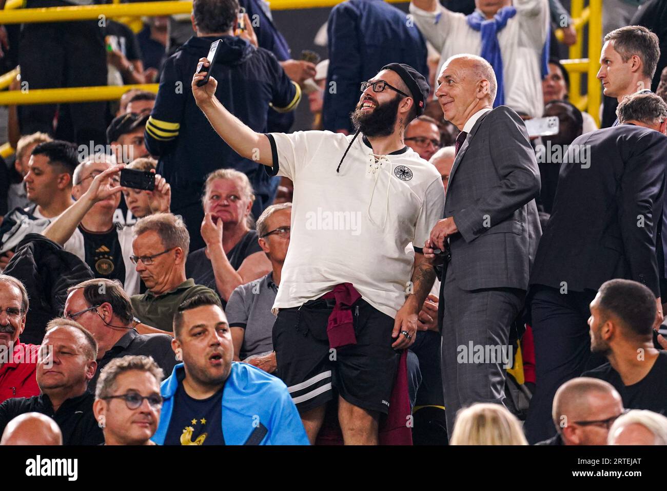 DORTMUND, GERMANY - SEPTEMBER 12: A fan is taking a selfie with Germany's DFB-director Bernd Neuendorf during the International Friendly match between Germany and France at Signal Iduna Park on September 12, 2023 in Dortmund, Germany. (Photo by Joris Verwijst/BSR Agency) Stock Photo