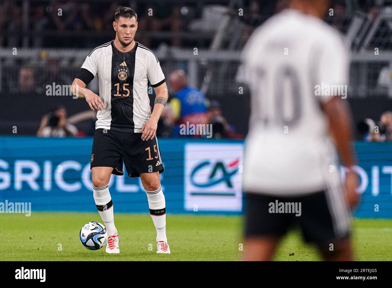 Dortmund, Germany. 12th Sep, 2023. DORTMUND, GERMANY - SEPTEMBER 12: Niklas Sule of Germany runs with the ball during the International Friendly match between Germany and France at Signal Iduna Park on September 12, 2023 in Dortmund, Germany. (Photo by Joris Verwijst/BSR Agency) Credit: BSR Agency/Alamy Live News Stock Photo