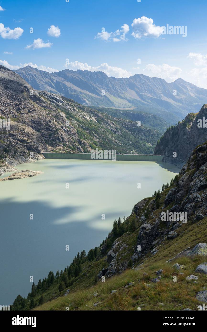 View From Bignami Hut Of Alpe Gera Alpine Lake And Dam In The Mountains view-from-bignami-hut-of-alpe-gera-alpine-lake-and-dam-in-the-mountains