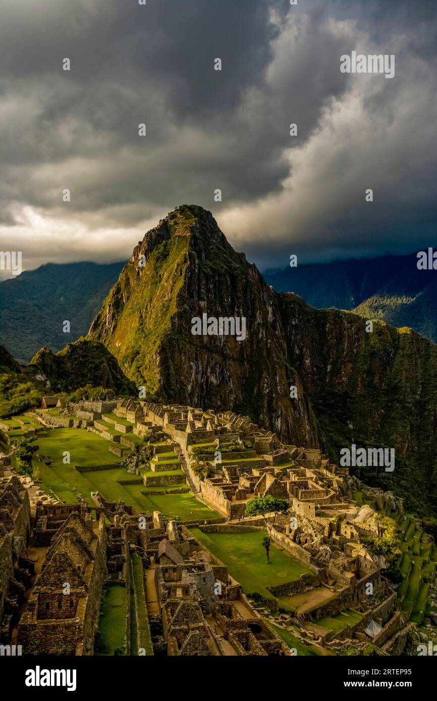 Reconstructed stone buildings on Machu Picchu; Machu Picchu, Peru Stock Photo