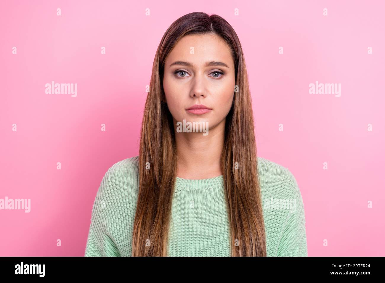 Portrait photo of cute young girl confident serious face wearing green ...