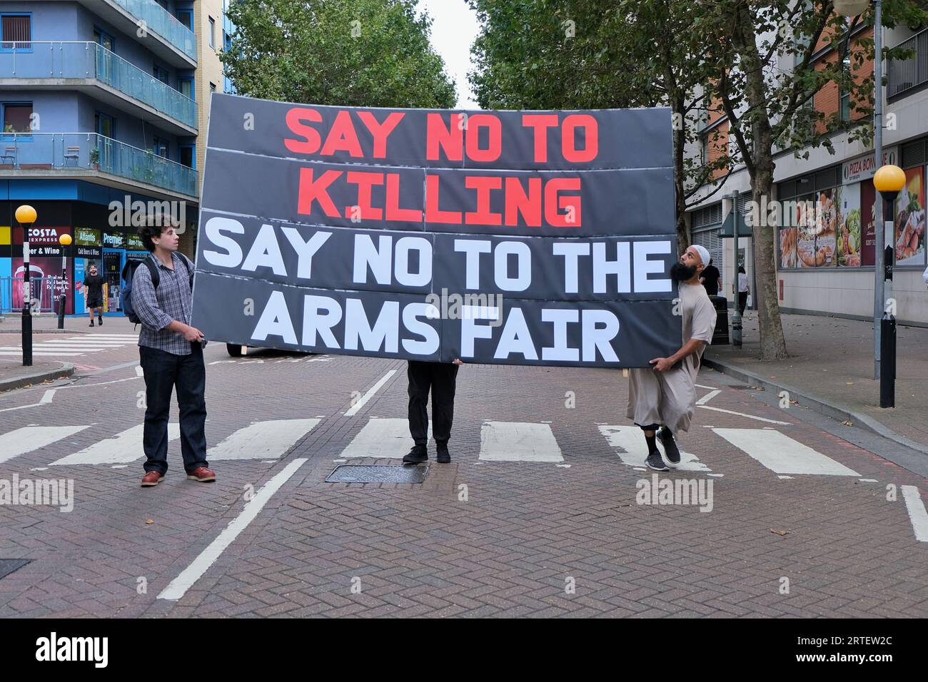 London, UK. 12th September, 2023. Anti-war protesters march in and block the roads surrounding the ExCel centre on the opening day of the DSEI arms fair. Credit: Eleventh Hour Photography/Alamy Live News Stock Photo