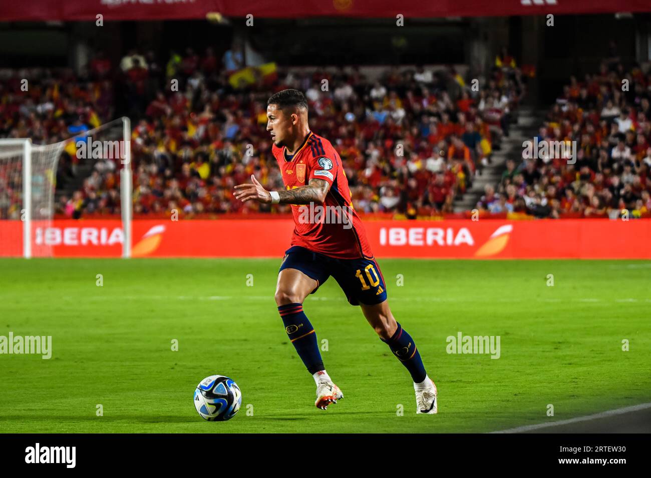 Granada, Granada. 12th Sep, 2023. GRANADA, SPAIN - SEPTEMBER 12: Yeremi Pino of Spain drives the ball during the match between Spain National Team and Cyprus Football Federation of FIFA European Qualifier on September 12, 2023, at Nuevo Los Carmenes in Granada, Spain. (Photo by Samuel Carreño/PxImages) Credit: Px Images/Alamy Live News Stock Photo