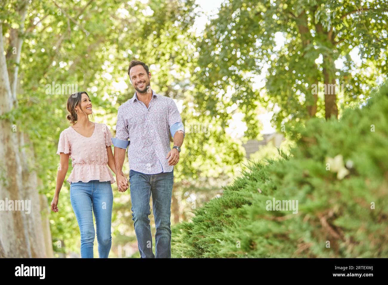 Hands holding button walking hi-res stock photography and images - Alamy