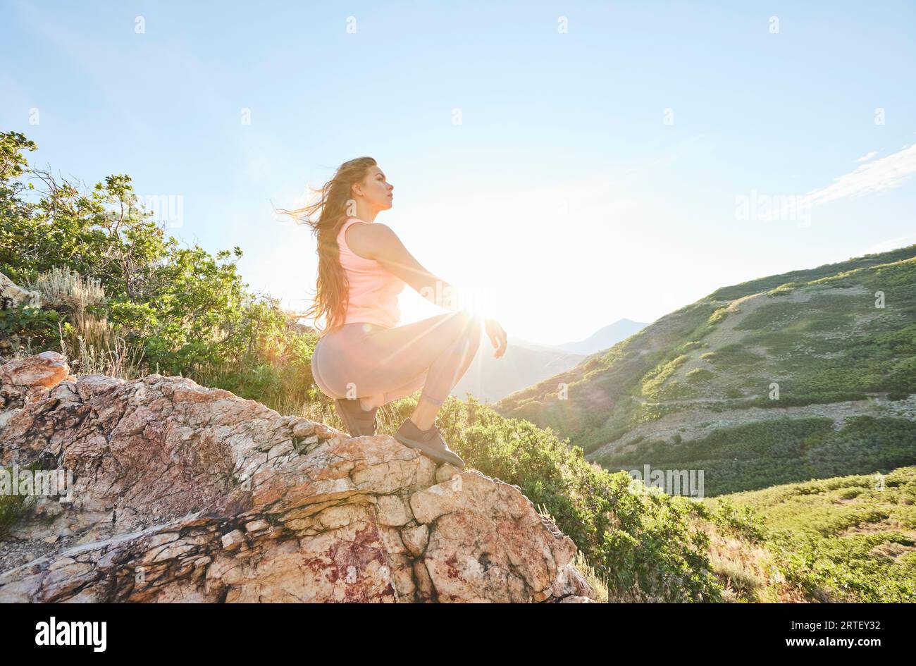 Crouching on rock hi-res stock photography and images - Alamy