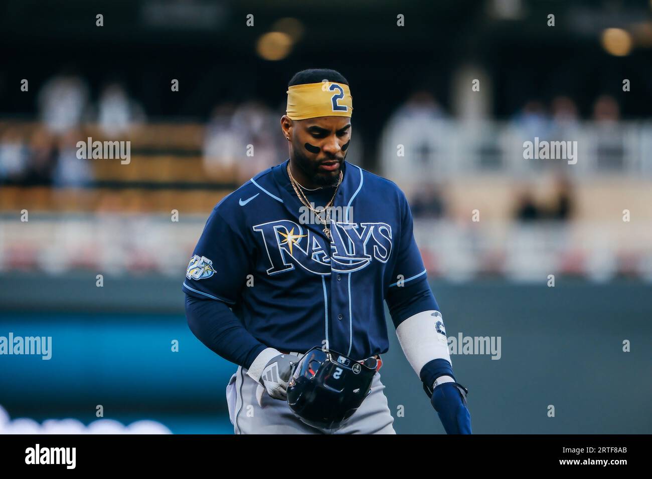Tampa Bay Rays' Yandy Diaz wears a rainbow arm band as the Rays celebrate  Pride day during a baseball game against the Texas Rangers Saturday, June  10, 2023, in St. Petersburg, Fla. (