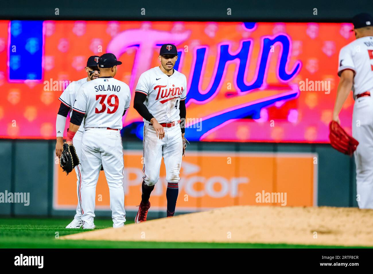 Minnesota Twins first baseman Donovan Solano fields a ball hit by the  Houston Astros in the ninth inning of a baseball game Sunday, April 9,  2023, in Minneapolis. The Astros won 5-1. (