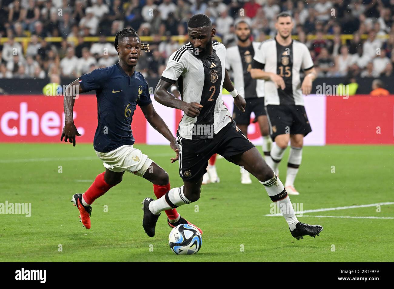 Dortmund, Germany. 12th Sep, 2023. Antonio Ruediger (R) of Germany vies with Eduardo Camavinga of France during a friendly match between Germany and France in Dortmund, Germany, Sept. 12, 2023. Credit: Ulrich Hufnagel/Xinhua/Alamy Live News Stock Photo