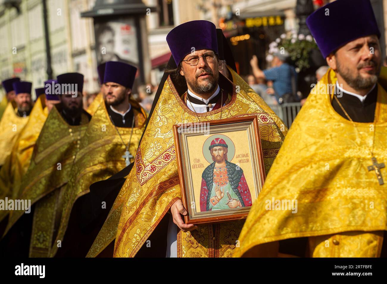 Orthodox priests walk during a religious procession along Nevsky ...