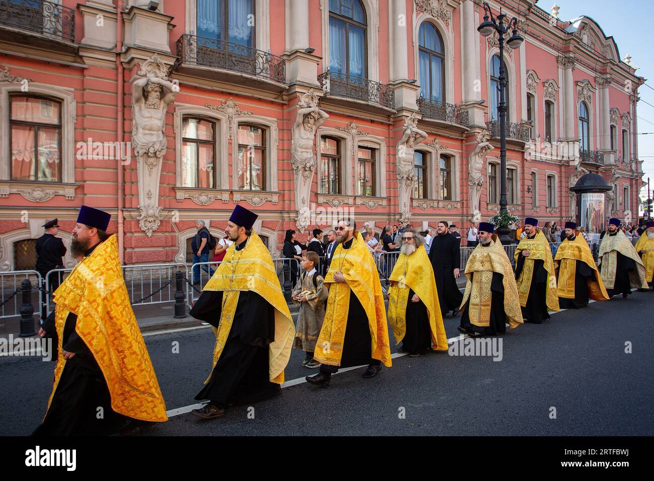Orthodox priests walk during a religious procession along Nevsky ...