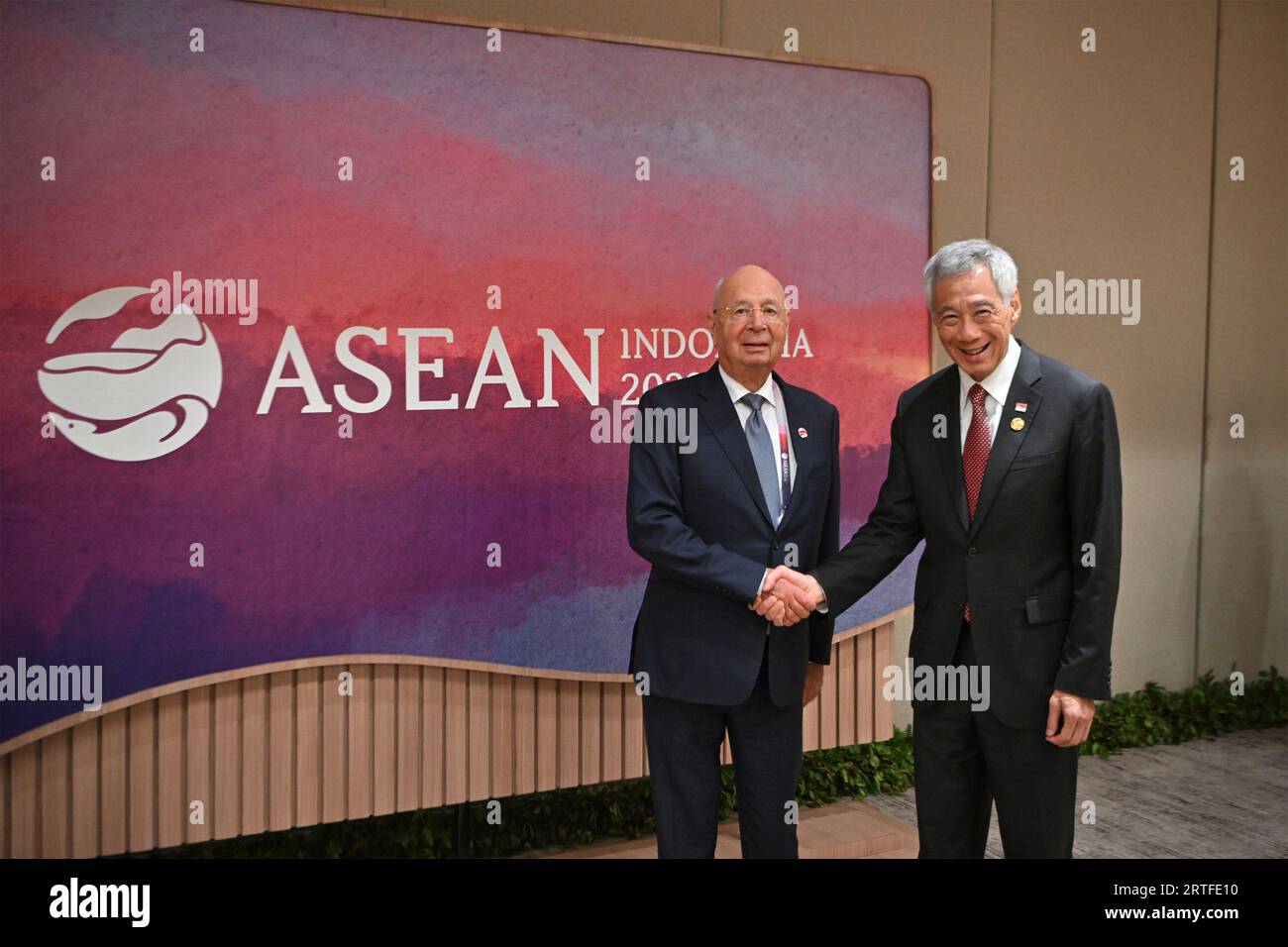 singapore-prime-minister-lee-hsien-loong-right-held-a-meeting-with-klaus-schwab-world-economic-forum-founder-and-executive-chairman-on-the-sidelines-of-the-43rd-asean-summit-in-jakarta-5-september-2023-singapore-press-via-ap-images-2RTFE10.jpg
