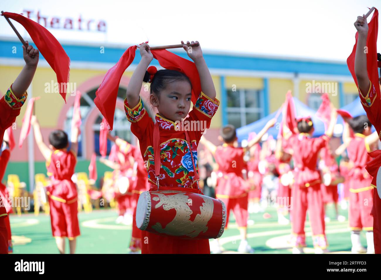 Luannan County - May 31, 2019: Children waist drum performance to celebrate International Children's Day, Luannan County, Hebei Province, China Stock Photo