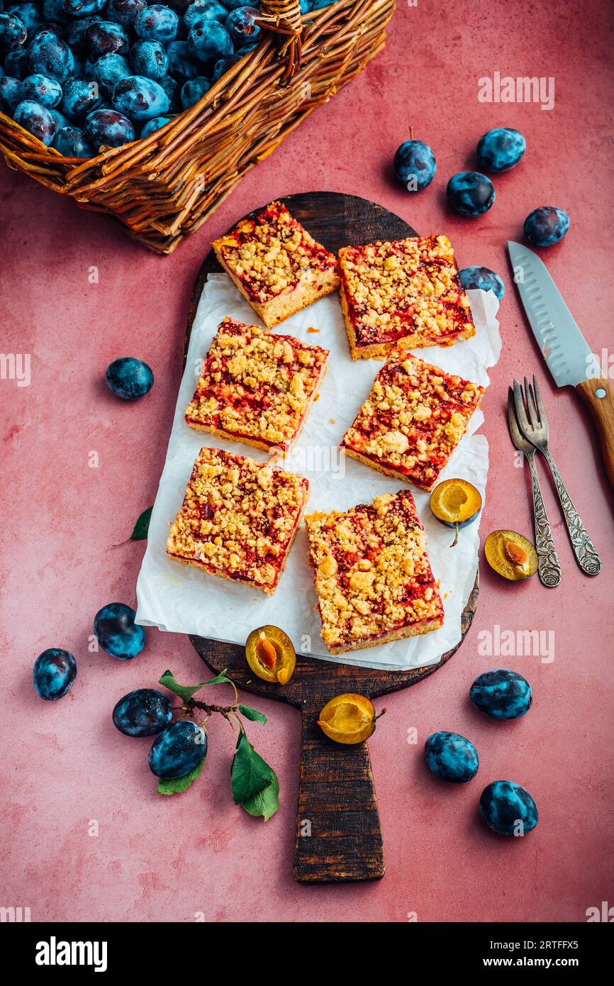 Homemade vegan German plum cake (Zwetschgenkuchen) with yeast dough and ...