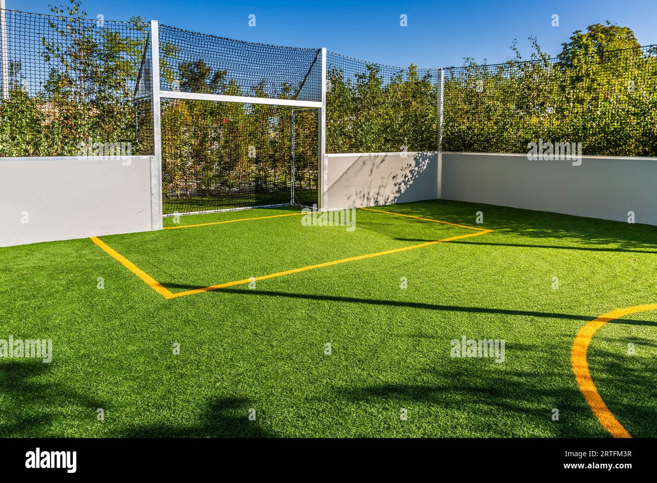 Playing field for small garden with artificial lawn, synthetic turf playing field, artificial grass pitch Stock Photo