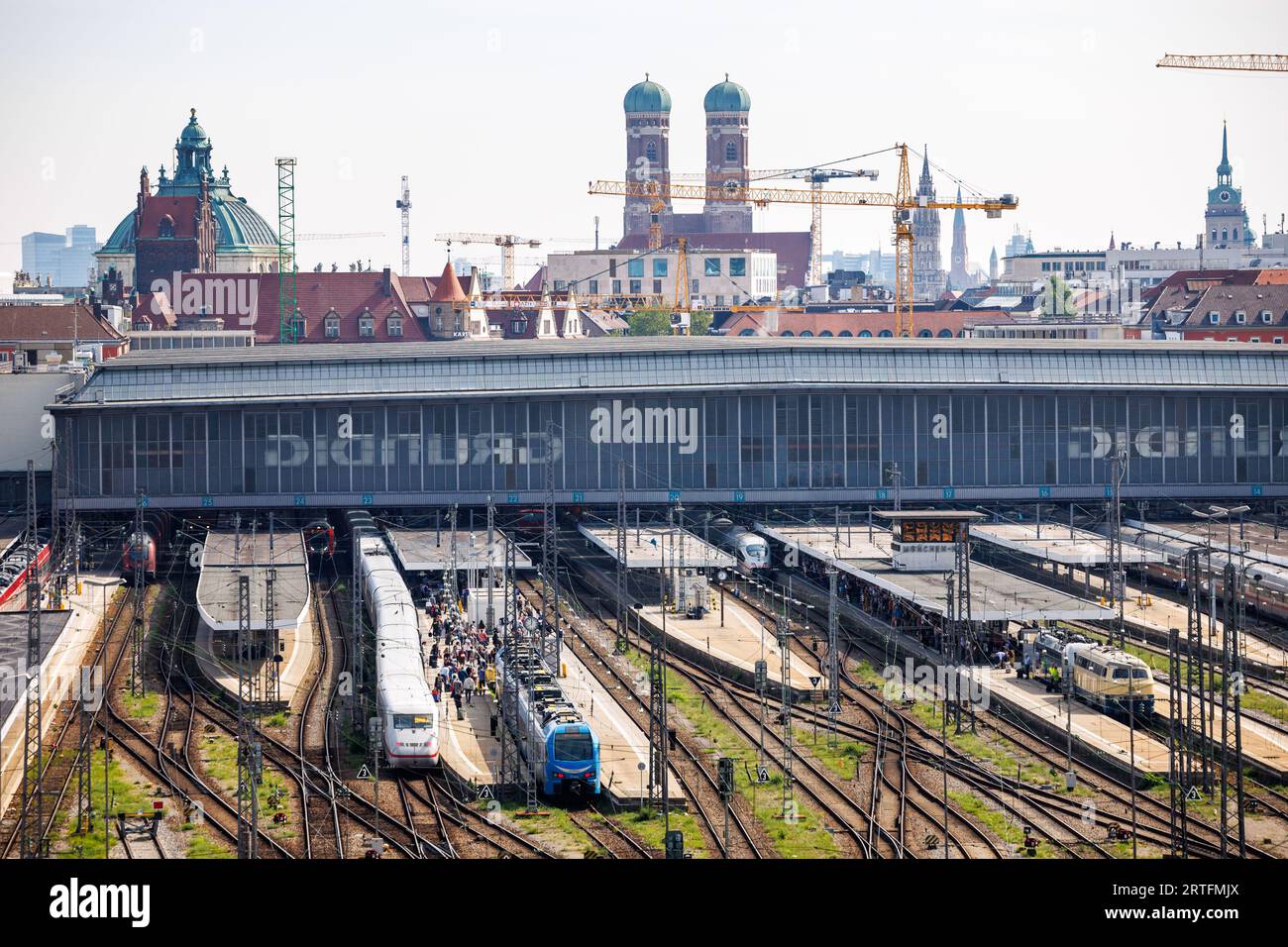 Munich, Germany. 12th Sep, 2023. The tracks in front of the main station of Munich can be seen in front of the old town of Munich with the Frauenkirchen. Credit: Matthias Balk/dpa/Alamy Live News Stock Photo