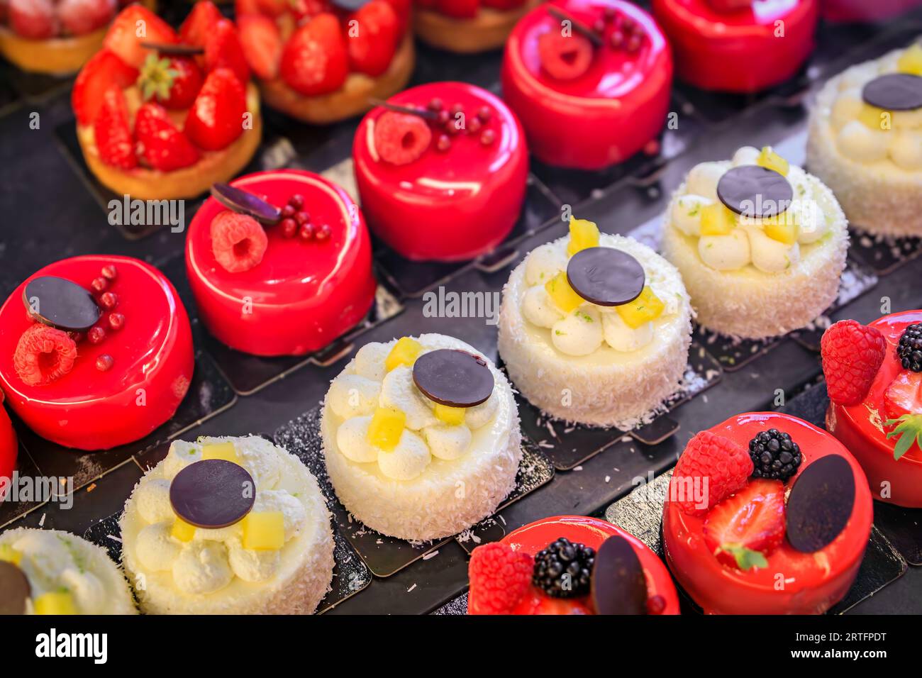 Selection of delicate petit four desserts on display at an artisanal bakery cafe in Old Town or Vieille Ville in Nice, French Riviera, South of France Stock Photo