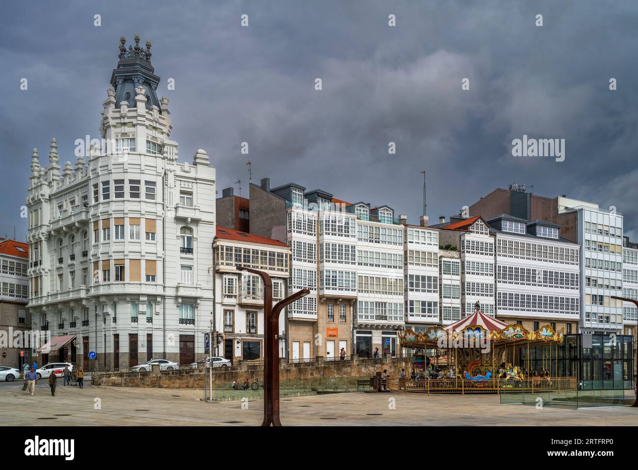 Glazed window balconies (galerias) on waterfront, A Coruna, Galicia, Spain Stock Photo