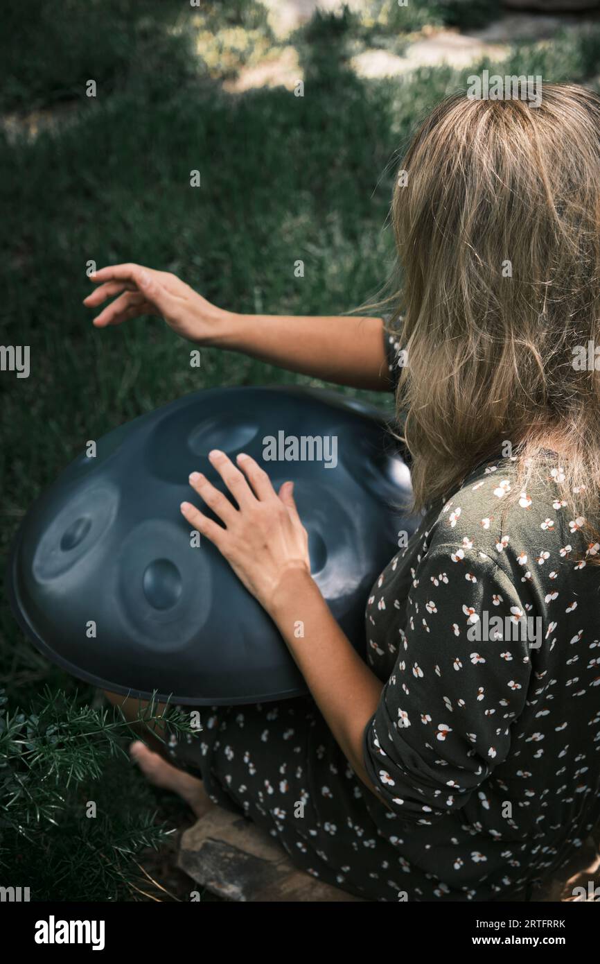 Handpan player hi-res stock photography and images - Alamy