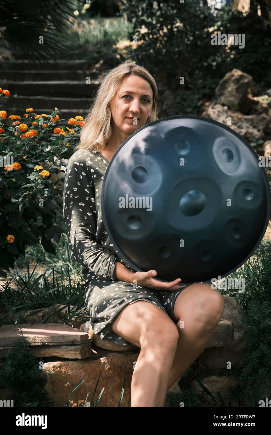Handpan player hi-res stock photography and images - Alamy