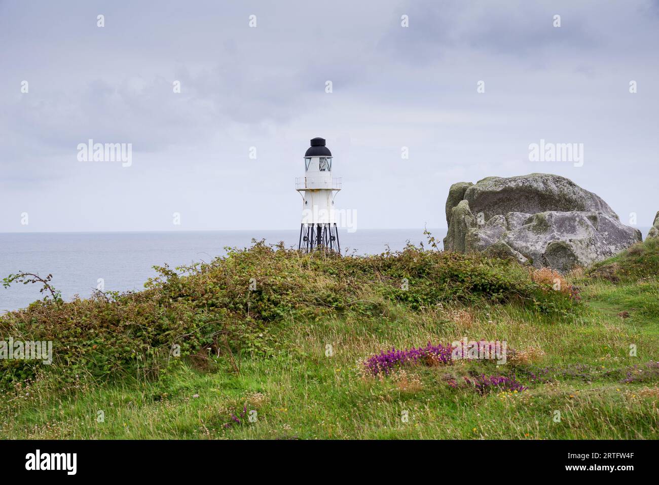 The picturesque Peninnis Head Lighthouse on St Marys island, Isles of Scilly Stock Photo