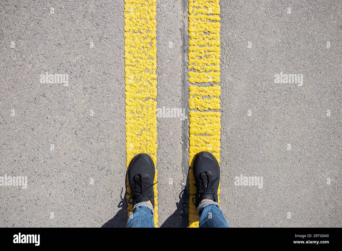 Yellow diagonals and red stripe, Lines on pavement in Penti…