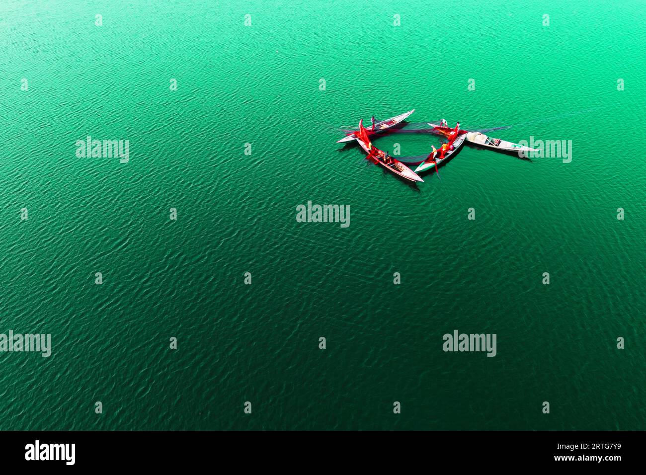 Bogra, Rajshahi, Bangladesh. 13th Sep, 2023. Fishermen stretch out an ...