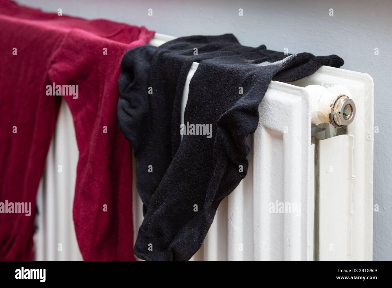 Washing drying on a radiator Stock Photo Alamy